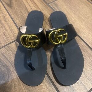 Gucci Black Sandals with Gold Emblem